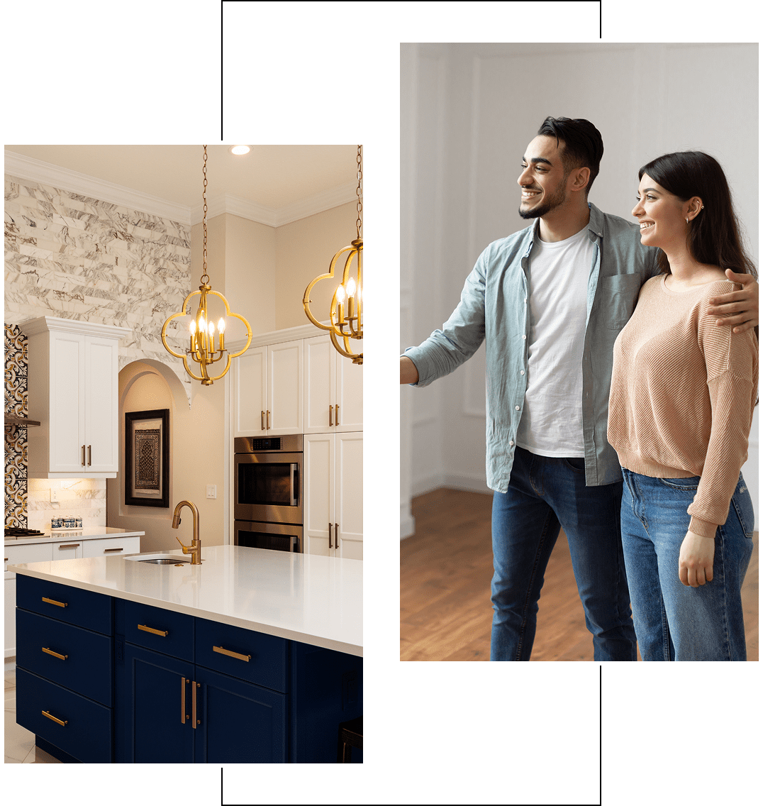 Couple admiring modern kitchen with pendant lights and navy cabinetry.